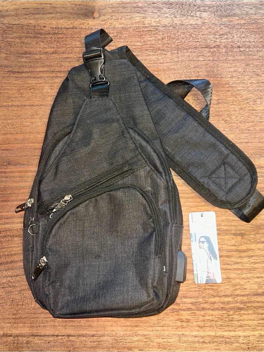 Nupouch Anti-Theft Black Crossbody Sling Bag day pack, USB Charging Port & cable